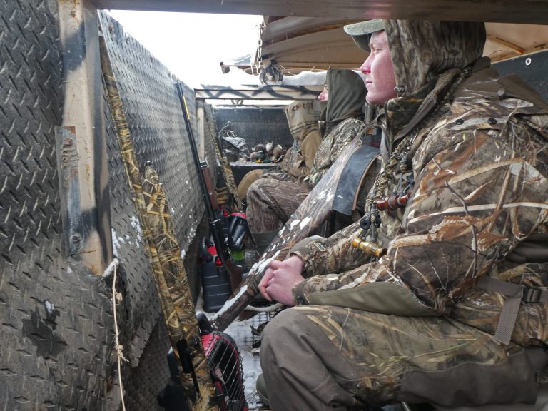 Hunters in Pit Blind