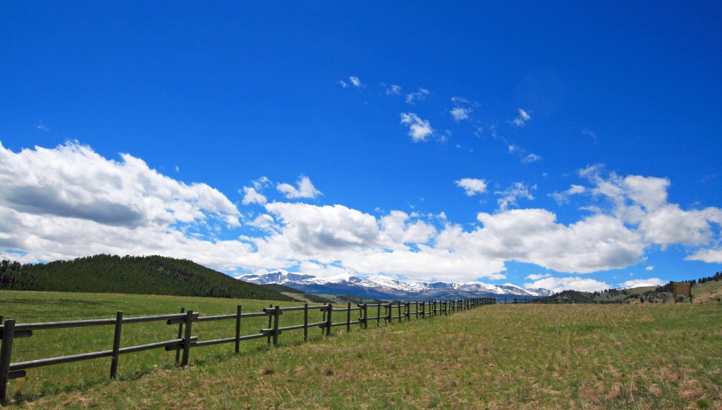 Fence Under Blue Sky in a Sheridan WY ranch