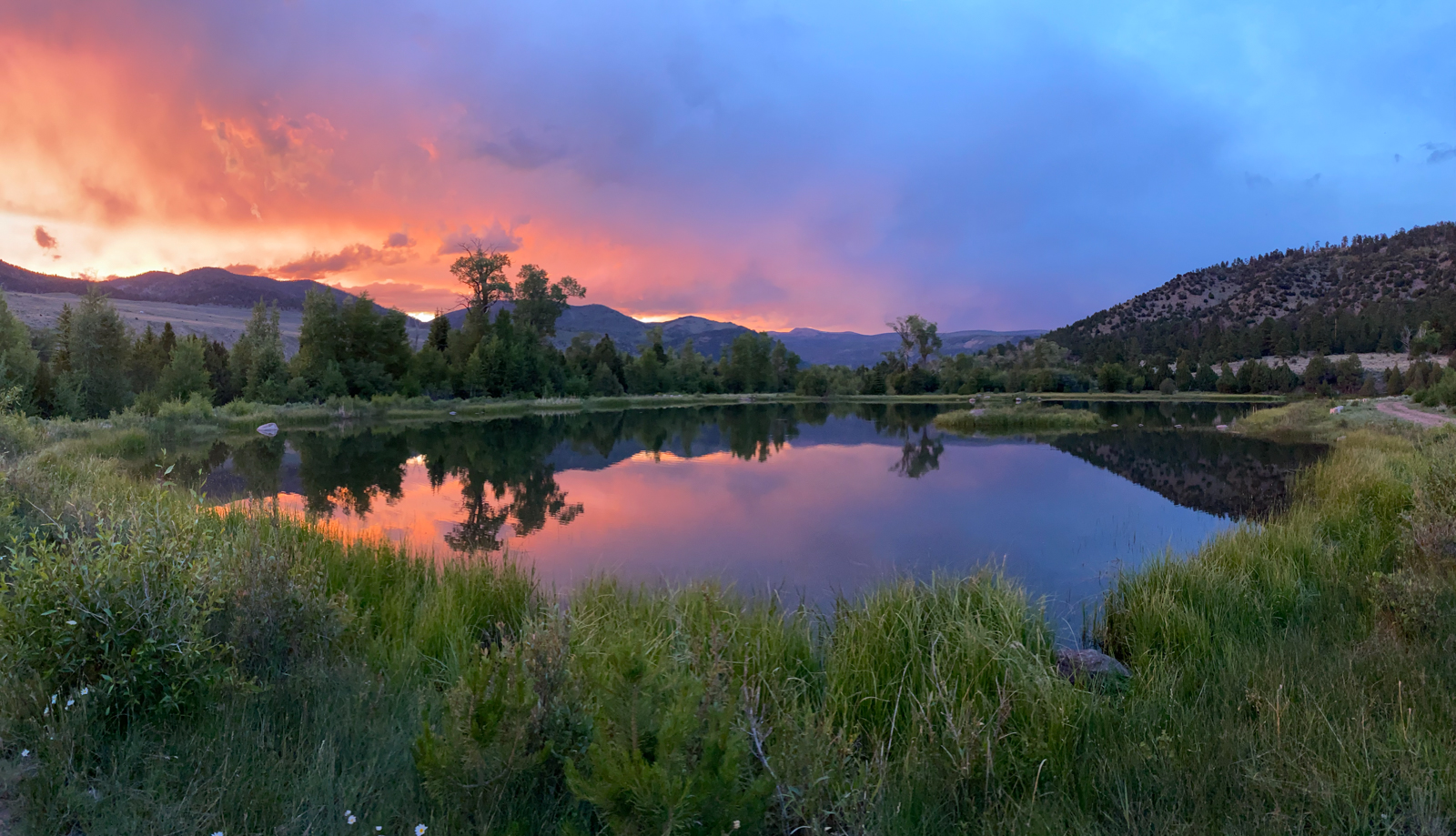 lake at sunset on ranch in Utah for sale