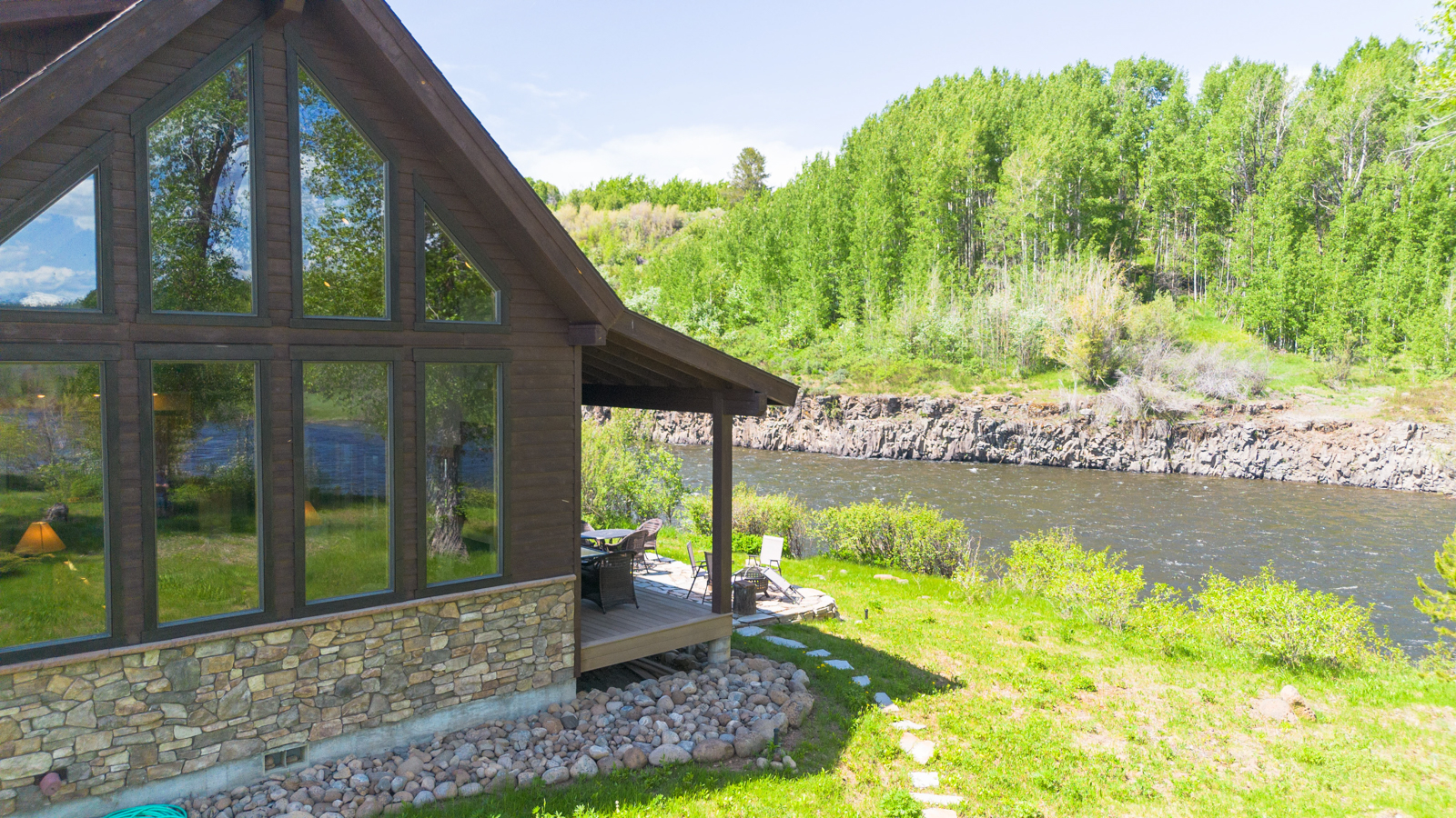 main house exterior next to the river