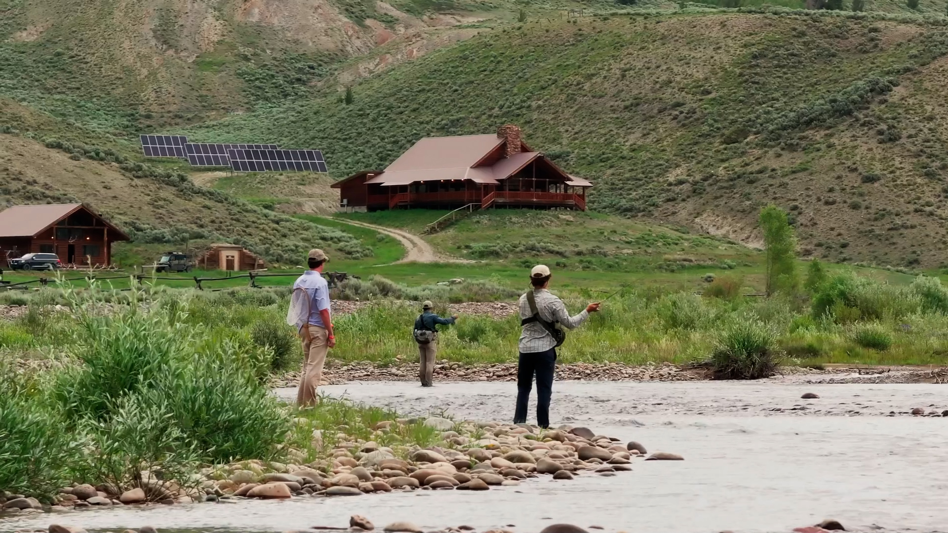 fishermen along the river