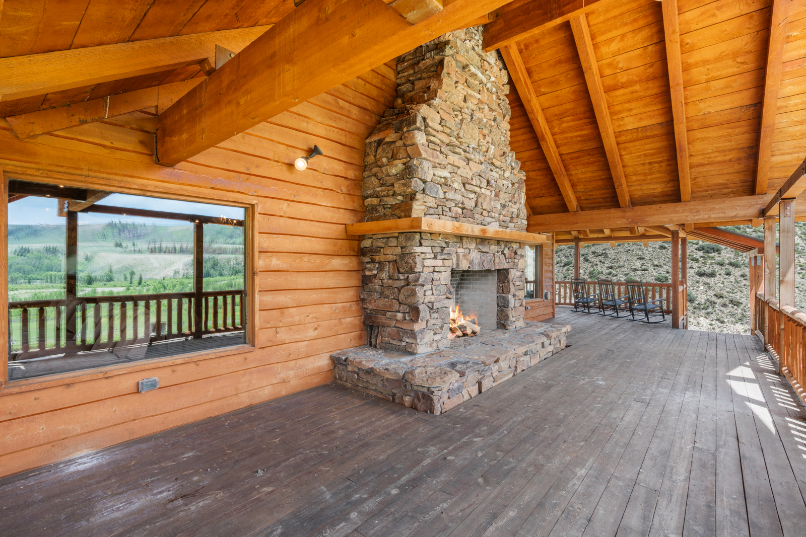 outdoor fireplace on wyoming fly fishing ranch