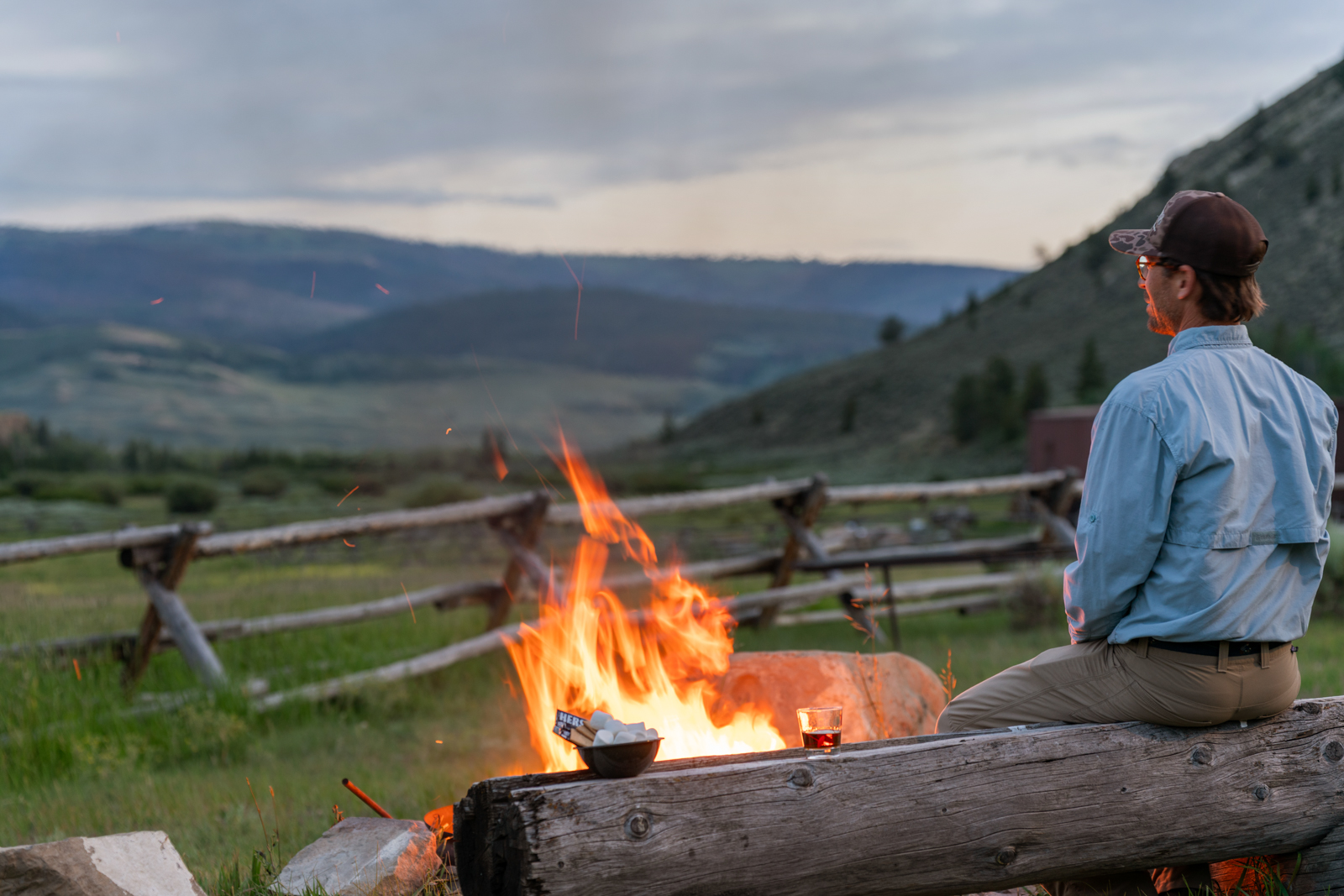 man next to fire pit