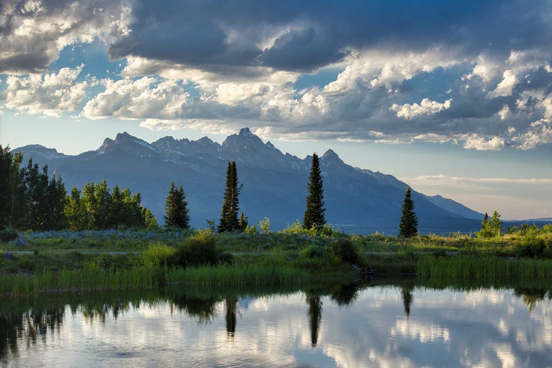 pond with mountain view