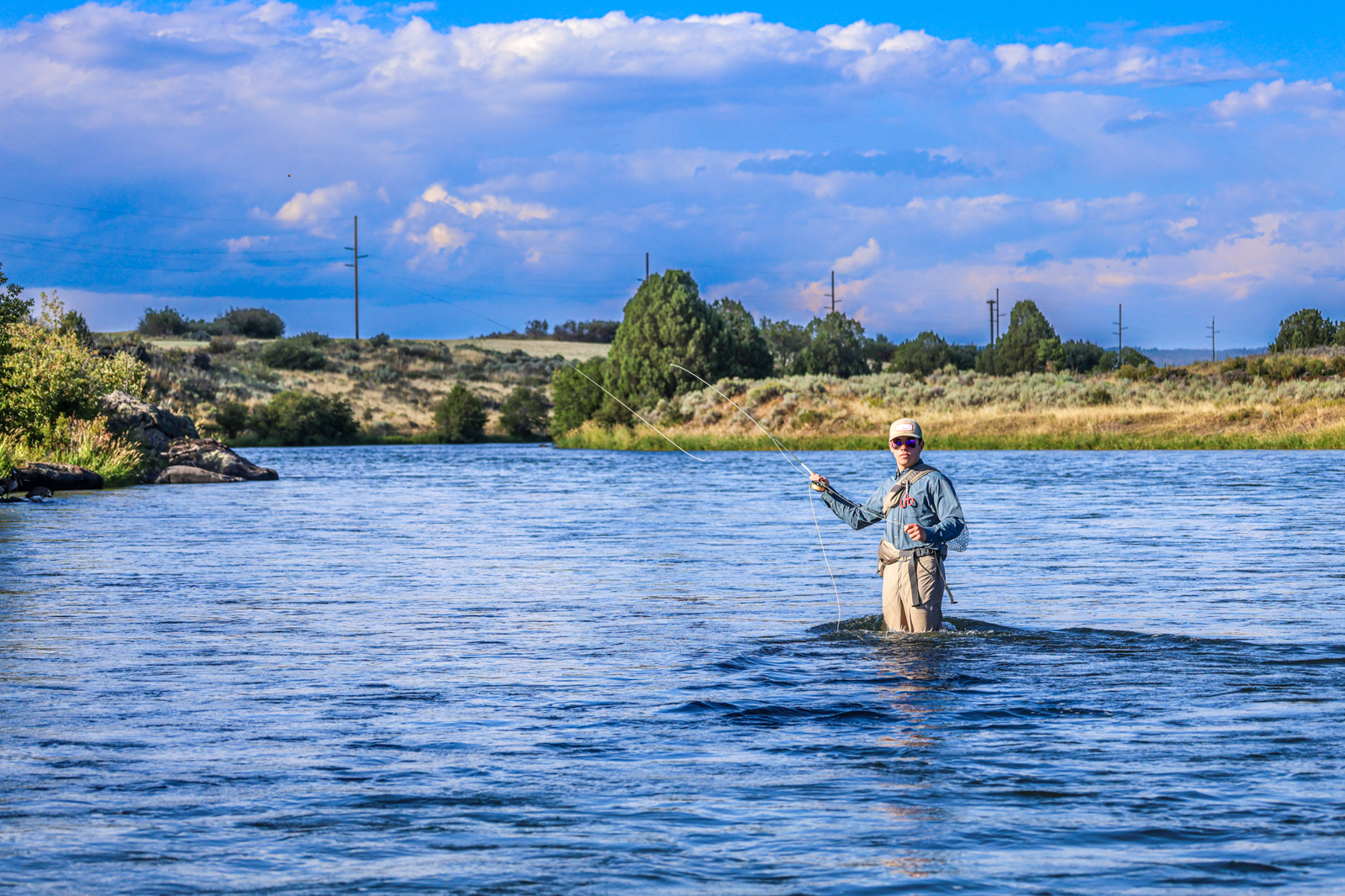 fisherman in river