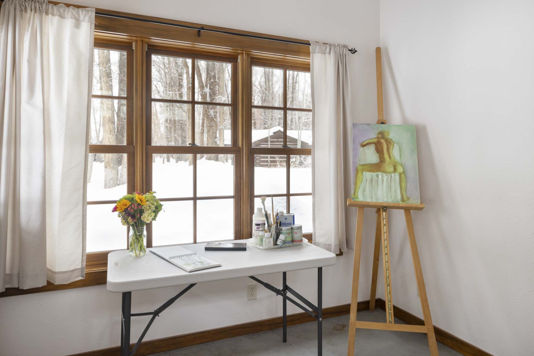 room with painting on eisele