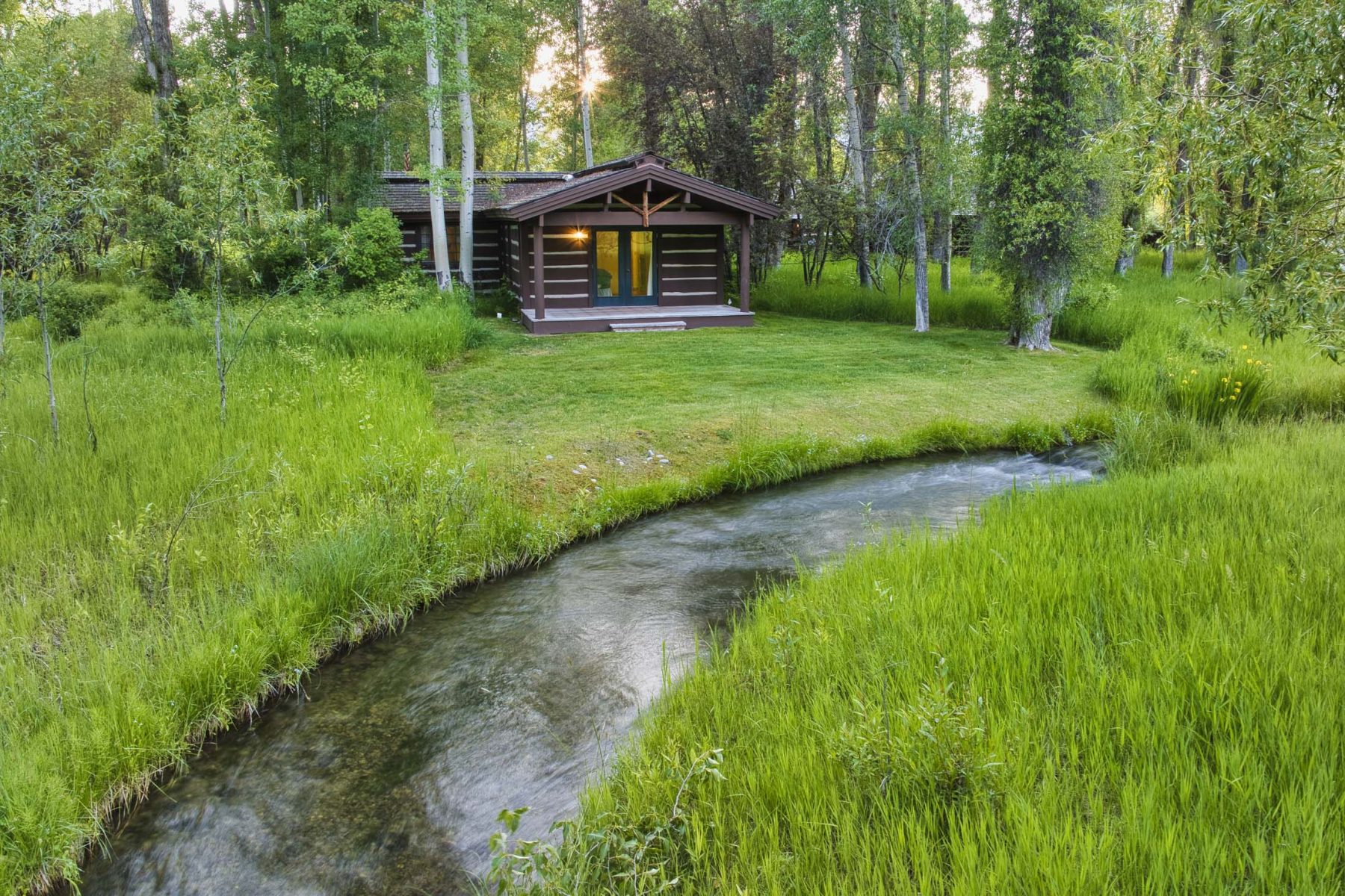 cabin next to river